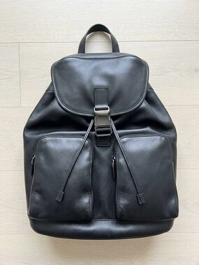 Prada Black Leather Drawstring Backpack with Front Pockets